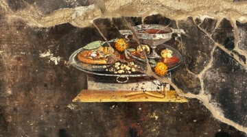 Pompei, l’antenata della pizza in un dipinto di 2000 anni fa